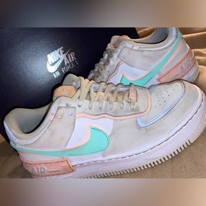 Nike air force 1’s. Light blue/pink. A Size 8.5